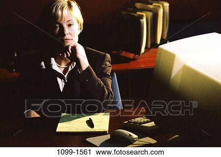 desk, woman, night, computer, business, Middle-aged, contemplation View Large Photo Image Stock Image - desk, woman, night, computer, business, Middle-aged, contemplation. Fotosearch