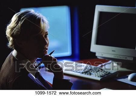 desk, woman, night, staring, computer, business, Middle-aged View Large Photo Image Stock Image - desk, woman, night, staring, computer, business, Middle-aged. Fotosearch