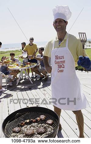 eating, table, hat, cooking, drinking, happy, outdoors View Large Photo Image Stock Image - eating, table, hat, cooking, drinking, happy, outdoors. Fotosearch