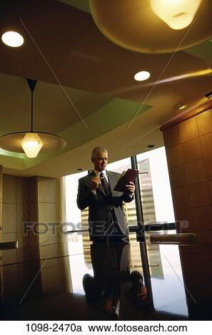 eyeglasses, senior, reading, business, Middle-aged, planning, solitude View Large Photo Image Stock Image - eyeglasses, senior, reading, business, Middle-aged, planning, solitude. Fotosearch