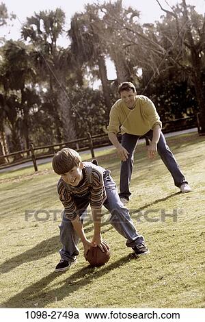 fence, people, playing, ball, football, trees, outdoors View Large Photo Image Stock Image - fence, people, playing, ball, football, trees, outdoors. Fotosearch