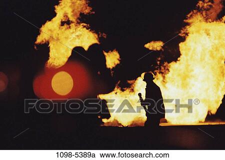 fire, people, silhouette, heat, outdoors, risk, dangerous View Large Photo Image Stock Image - fire, people, silhouette, heat, outdoors, risk, dangerous. Fotosearch