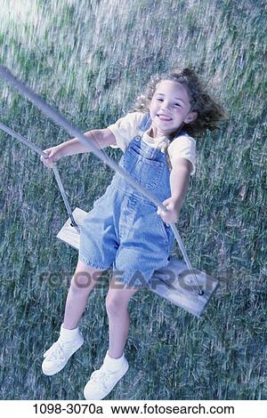 grass, overhead, people, smiling, playing, swinging, girl View Large Photo Image Stock Image - grass, overhead, people, smiling, playing, swinging, girl. Fotosearch