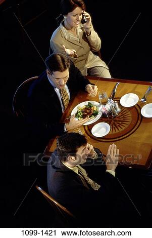 group, eating, telephone, table, phone, business, restaurant View Large Photo Image Stock Image - group, eating, telephone, table, phone, business, restaurant. Fotosearch