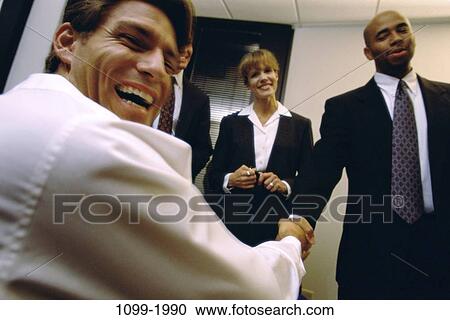 group, multiethnic, business, Middle-aged, joyous, handshake, indoors View Large Photo Image Stock Image - group, multiethnic, business, Middle-aged, joyous, handshake, indoors. Fotosearch