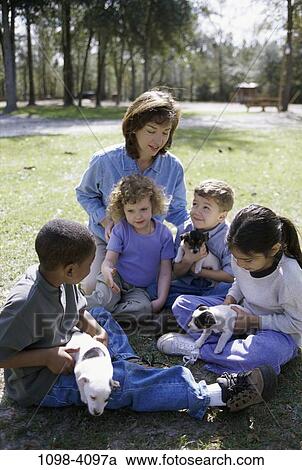 group, multiethnic, people, animals, puppies, teacher, school View Large Photo Image Stock Image - group, multiethnic, people, animals, puppies, teacher, school. Fotosearch