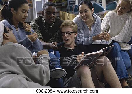Picture - group, multiethnic, people, school, studying, education, learning. Fotosearch