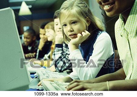 group, multiethnic, people, concentration, school, typing, concentrating View Large Photo Image Stock Image - group, multiethnic, people, concentration, school, typing, concentrating. Fotosearch