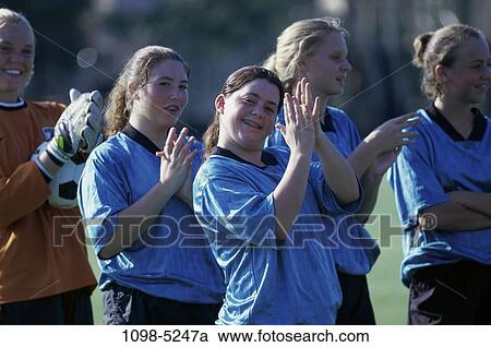 Stock Image - group, people, clapping, outdoors, teens, team, happiness. Fotosearch