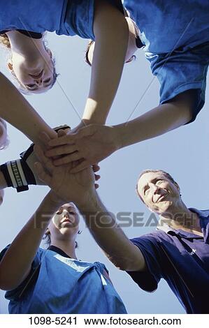 Stock Image - group, people, hands, outdoors, unity, teens. Fotosearch