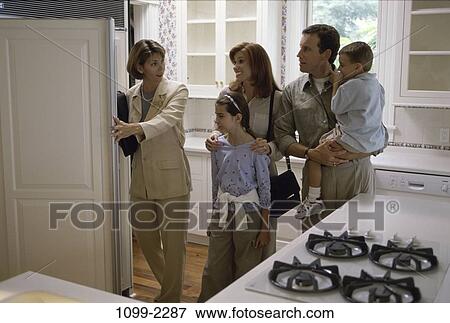 group, people, home, moving, showing, kitchen View Large Photo Image Stock Photo - group, people, home, moving, showing, kitchen. Fotosearch