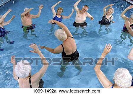 Stock Image - group, people, pool, senior, stretching, exercise, exercising. Fotosearch
