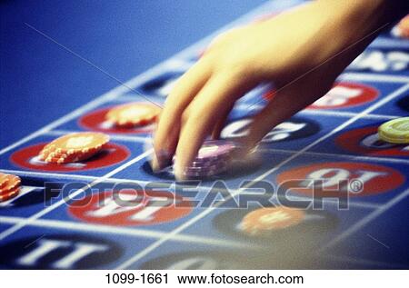 hand, table, choices, motion, risk, chips, choosing View Large Photo Image Stock Image - hand, table, choices, motion, risk, chips, choosing. Fotosearch