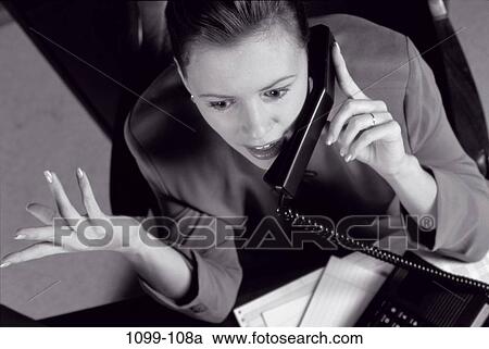 hands, desk, woman, telephone, talking, phone, gesturing View Large Photo Image Stock Image - hands, desk, woman, telephone, talking, phone, gesturing. Fotosearch