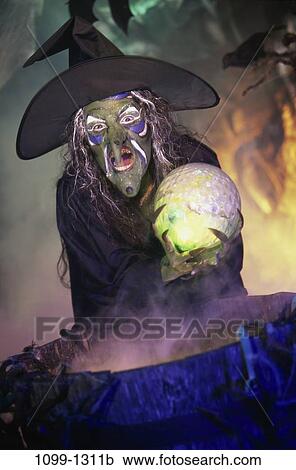 Stock Image - hat, smoke, ball, holding, costume, Halloween, cauldron. Fotosearch