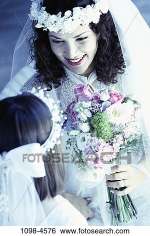 Stock Photograph - Hispanic, flowers, flower, wedding, bouquet, veil, bride. Fotosearch