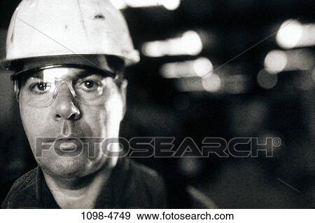 Stock Photo - industrial, serious, posing, hardhat, pose, Occupations various. Fotosearch