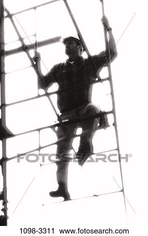 Stock Image - industry, construction, silhouette, worker, scaffold, occupation. Fotosearch