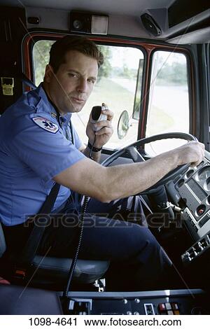 industry, driving, brunette, radio, ambulance View Large Photo Image Stock Image - industry, driving, brunette, radio, ambulance. Fotosearch