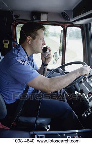Stock Image - industry, driving, radio, ambulance, emergency. Fotosearch