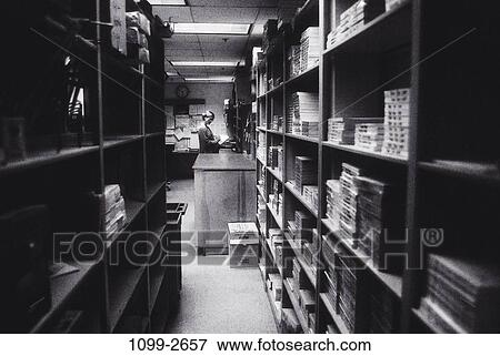industry, woman, writing, warehouse, shelves, inventory, stock View Large Photo Image Stock Photo - industry, woman, writing, warehouse, shelves, inventory, stock. Fotosearch