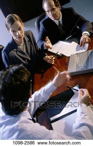 meeting, group, eyeglasses, laptop, business, indoors, Caucasian View Large Photo Image Stock Photograph - meeting, group, eyeglasses, laptop, business, indoors, Caucasian. Fotosearch