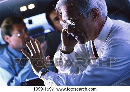 meeting, group, men, telephone, limousine, listening, senior View Large Photo Image Stock Photo - meeting, group, men, telephone, limousine, listening, senior. Fotosearch