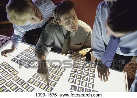 Stock Photograph - meeting, group, people, industry, choices, pointing. Fotosearch