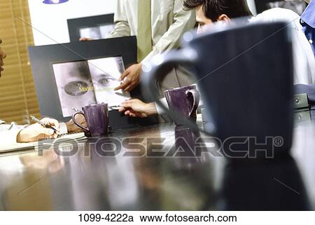 meeting, group, table, presentation, coffee, pointing, business View Large Photo Image Stock Image - meeting, group, table, presentation, coffee, pointing, business. Fotosearch