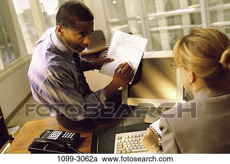 meeting, multiethnic, desk, keyboard, telephone, paperwork View Large Photo Image Stock Image - meeting, multiethnic, desk, keyboard, telephone, paperwork. Fotosearch
