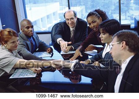 meeting, multiethnic, eyeglasses, business, Middle-aged, consolation, indoors View Large Photo Image Stock Photo - meeting, multiethnic, eyeglasses, business, Middle-aged, consolation, indoors. Fotosearch