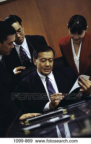 meetings, business, executives, teamwork, Middle-aged, serious, Asian View Large Photo Image Stock Photo - meetings, business, executives, teamwork, Middle-aged, serious, Asian. Fotosearch