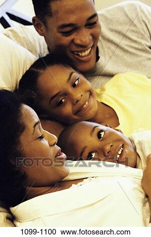 mother, people, listening, talking, smiling, bed, attentive View Large Photo Image Stock Image - mother, people, listening, talking, smiling, bed, attentive. Fotosearch