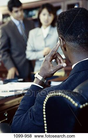 multiethnic, desk, formal, business, challenges, Middle-aged, executives View Large Photo Image Stock Photo - multiethnic, desk, formal, business, challenges, Middle-aged, executives. Fotosearch