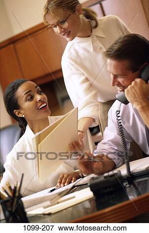 multiethnic, desk, telephone, phone, business, Middle-aged, teamwork View Large Photo Image Stock Photo - multiethnic, desk, telephone, phone, business, Middle-aged, teamwork. Fotosearch