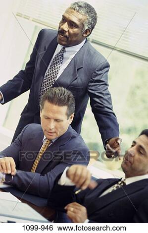 multiethnic, men, business, Middle-aged, executives, meetings, serious View Large Photo Image Stock Photograph - multiethnic, men, business, Middle-aged, executives, meetings, serious. Fotosearch