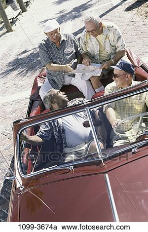 multiethnic, men, overhead, people, map, senior, car View Large Photo Image Stock Image - multiethnic, men, overhead, people, map, senior, car. Fotosearch