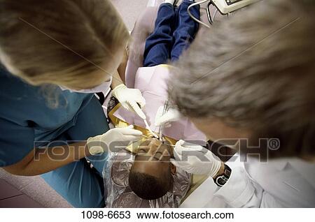 multiethnic, patient, dentist, doctor, equipment, tools, health View Large Photo Image Stock Image - multiethnic, patient, dentist, doctor, equipment, tools, health. Fotosearch