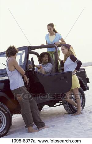 multiethnic, people, beach, friends, jeep, teens View Large Photo Image Stock Image - multiethnic, people, beach, friends, jeep, teens. Fotosearch