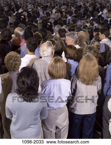 Stock Image - multiethnic, people, crowded, looking, watching, diversity, behind. Fotosearch