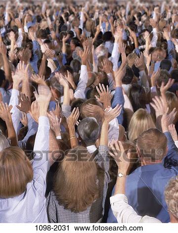 Stock Image - multiethnic, people, hands, waving, anticipation, greeting, crowd. Fotosearch