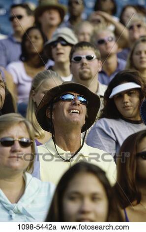 multiethnic, people, hats, sitting, watch, sunglasses, outdoors View Large Photo Image Stock Image - multiethnic, people, hats, sitting, watch, sunglasses, outdoors. Fotosearch
