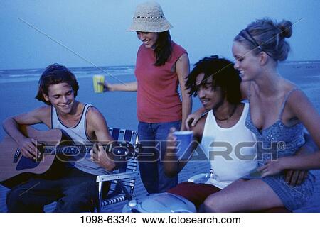 multiethnic, people, night, hat, music, drinking View Large Photo Image Stock Image - multiethnic, people, night, hat, music, drinking. Fotosearch