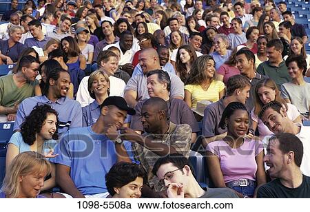 multiethnic, people, sitting, outdoors, crowd, spectators, sit View Large Photo Image Stock Image - multiethnic, people, sitting, outdoors, crowd, spectators, sit. Fotosearch