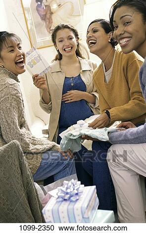 multiethnic, women, people, party, baby, laughing, holding View Large Photo Image Stock Image - multiethnic, women, people, party, baby, laughing, holding. Fotosearch