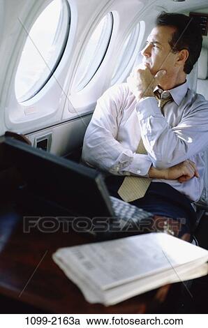 newspaper, laptop, business, contemplation, thinking, jet View Large Photo Image Stock Image - newspaper, laptop, business, contemplation, thinking, jet. Fotosearch