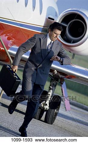 outdoors, time, stress, rush, briefcase, airplane View Large Photo Image Stock Image - outdoors, time, stress, rush, briefcase, airplane. Fotosearch