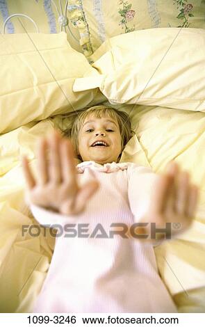 overhead, people, hands, bed, holding, girl, gesturing View Large Photo Image Stock Photograph - overhead, people, hands, bed, holding, girl, gesturing. Fotosearch