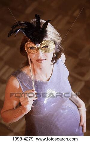 overhead, people, party, feathers, woman, formal, smiling View Large Photo Image Stock Photo - overhead, people, party, feathers, woman, formal, smiling. Fotosearch