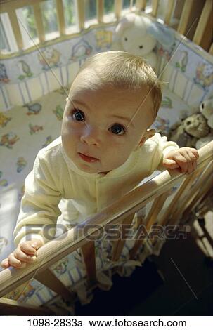 overhead, people, railing, baby, holding, crib, standing View Large Photo Image Stock Image - overhead, people, railing, baby, holding, crib, standing. Fotosearch